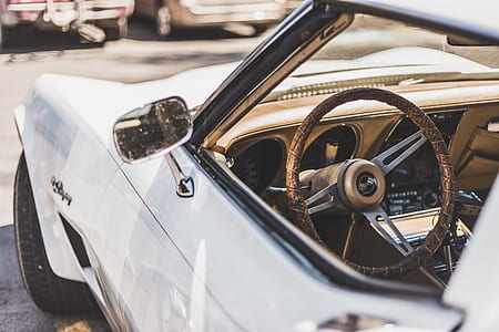 closeup photo of white classic convertible car thumbnail