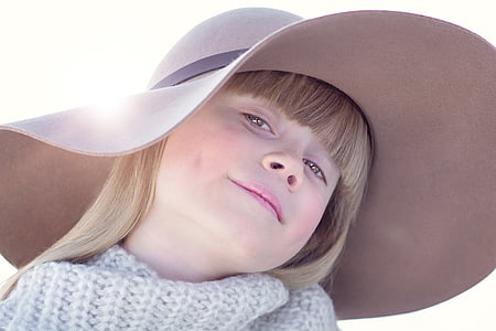 girl wearing gray sun hat thumbnail