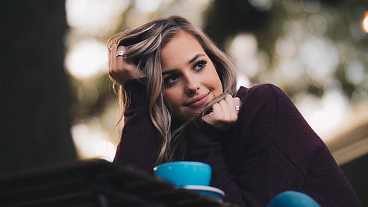 woman wearing black long-sleeved shirt thumbnail