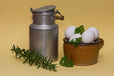 tubular milk container and tray of eggs thumbnail