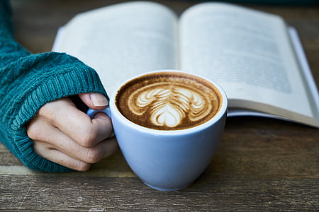 blue ceramic cup with cafe latte thumbnail