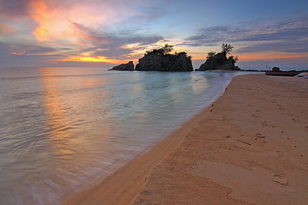 View of Beach Against Cloudy Sky thumbnail