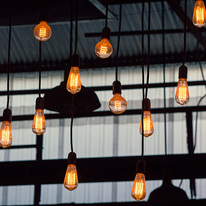 pendant lamp turned-on of selective focus photography thumbnail