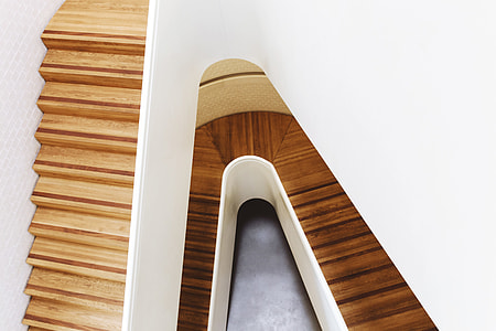 A modern wooden staircase captured in a building in London thumbnail