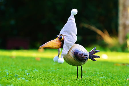 brown bird decor on grass thumbnail