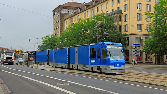 blue tram on road thumbnail