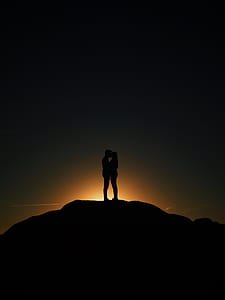 silhouette of two person kissing thumbnail
