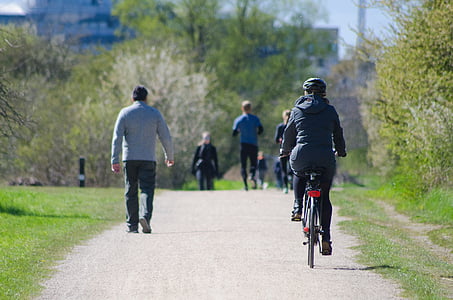 shallow focus photography of person riding on bicycle thumbnail