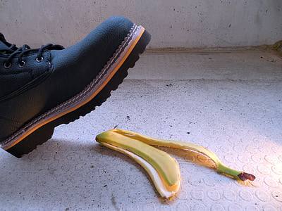 black leather work boot near yellow banana thumbnail