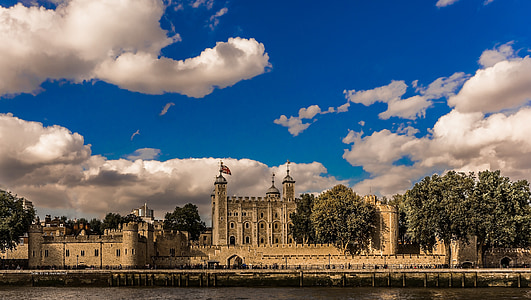 beige castle beside body of water thumbnail