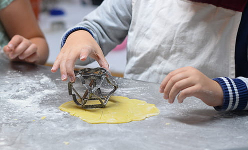 person holding gray dough cutter thumbnail