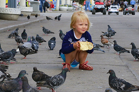 girl crouching on road thumbnail