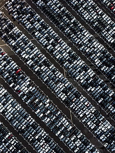 parking area full of vehicles on top view photography thumbnail