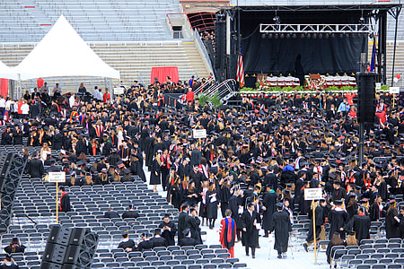 Graduates getting into seats in Madison, Wisconsin thumbnail