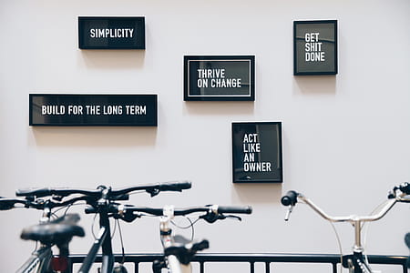 Framed Quotes Behind Bike Rack Photo thumbnail