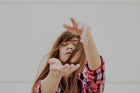 woman wearing red and white plaid shirt thumbnail