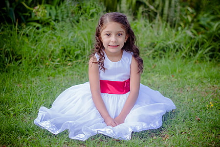 girl wearing white sleeveless dress thumbnail
