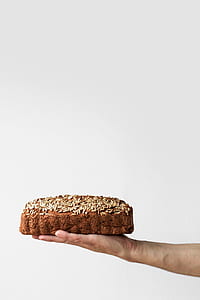 person holding baked bread thumbnail