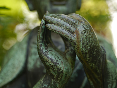 close-up photography of hand of statue thumbnail