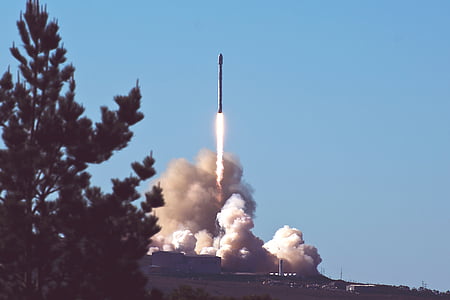 rocket launching near green tree thumbnail