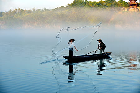 person throwing fishing net thumbnail