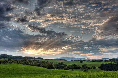 grass field under cloud formation thumbnail