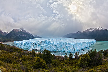 white ice cube on body of water photo thumbnail