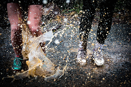 Legs splashing in the rain thumbnail