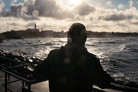Man watches the beach thumbnail