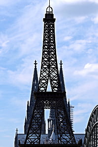 black tower under white clouds at daytime thumbnail