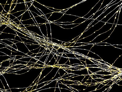 white string lights with black background thumbnail