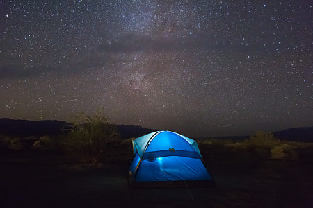 blue tent during nighttime thumbnail