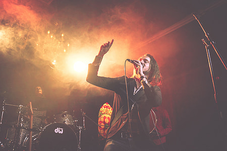 Music singer on stage at a concert thumbnail