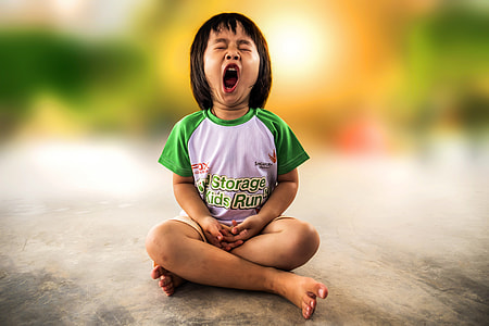 Kid Yawning while sitting thumbnail