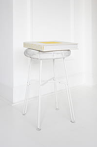 white mangold book on white bar stool thumbnail