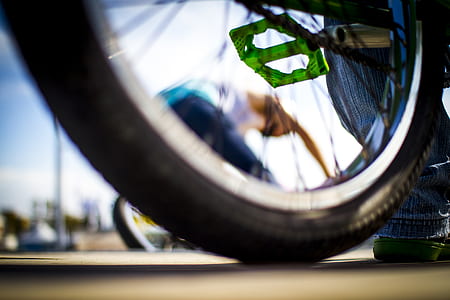 low angle photography of bike tires thumbnail