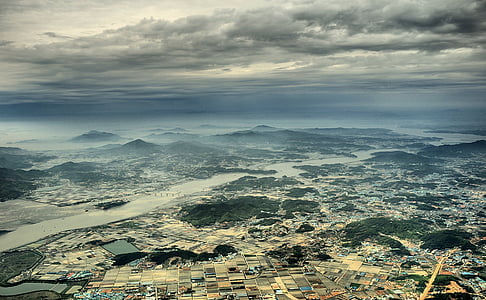 body of water and mountains thumbnail