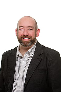 man wearing black notched lapel coat thumbnail