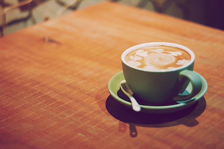 cappuccino served on green cup thumbnail
