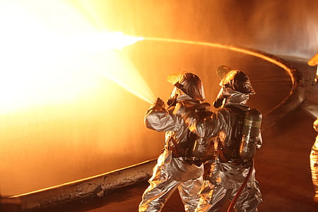 two person wearing Fire fighter uniform thumbnail