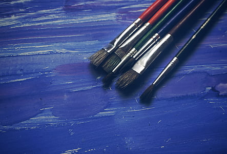 assorted-color paint brushes thumbnail