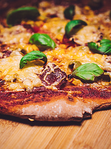 pizza with green leaf vegetable thumbnail