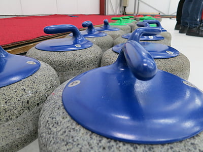 gray rock container with blue lids on table thumbnail