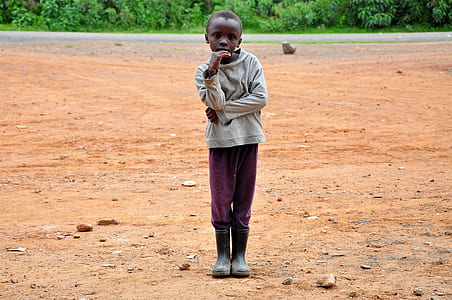 girl standing on ground field thumbnail