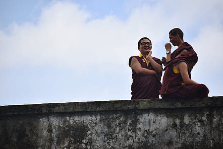 Photography of Three People Talking to Each Other thumbnail