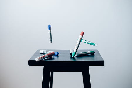 time lapse photography of pen marker falling on table thumbnail