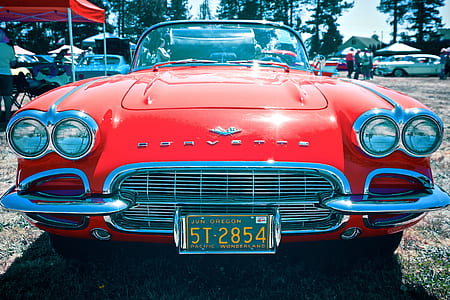red Chevrolet Corvette coupe thumbnail