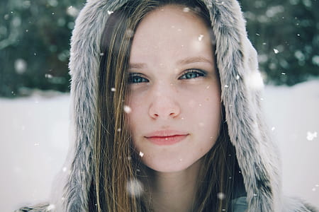woman in grey fur hooded top thumbnail