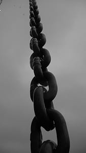 low angle photography of gray metal chain thumbnail