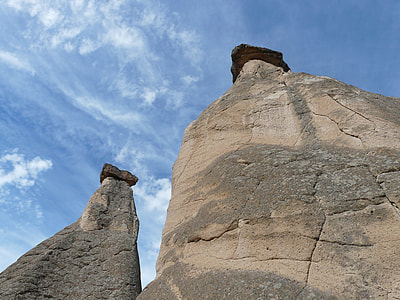 two beige-and-gray stone towers thumbnail